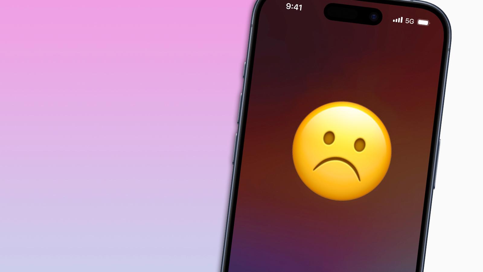 iphones 15 with a sad emoji face on it