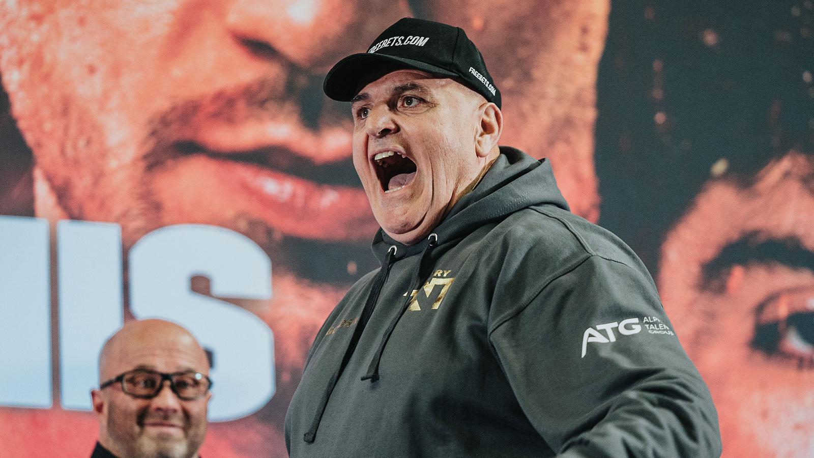 John Fury shouting on stage at Prime Card press conference